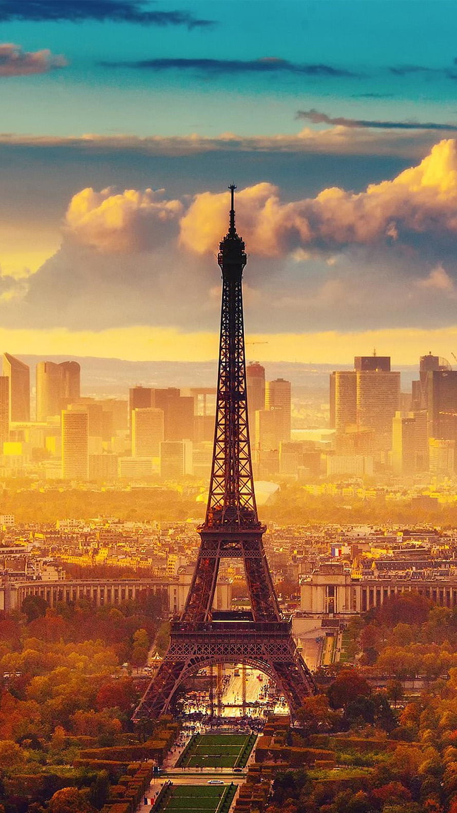Eiffel Tower at Golden Hour with Paris Cityscape and Dramatic Clouds HD phone wallpaper
