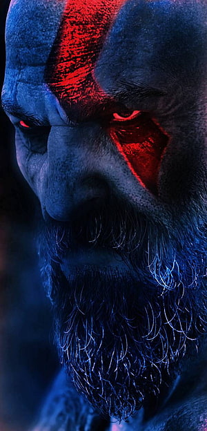 Kratos from God of War Ragnarok with glowing red tattoos and intense expression HD phone wallpaper