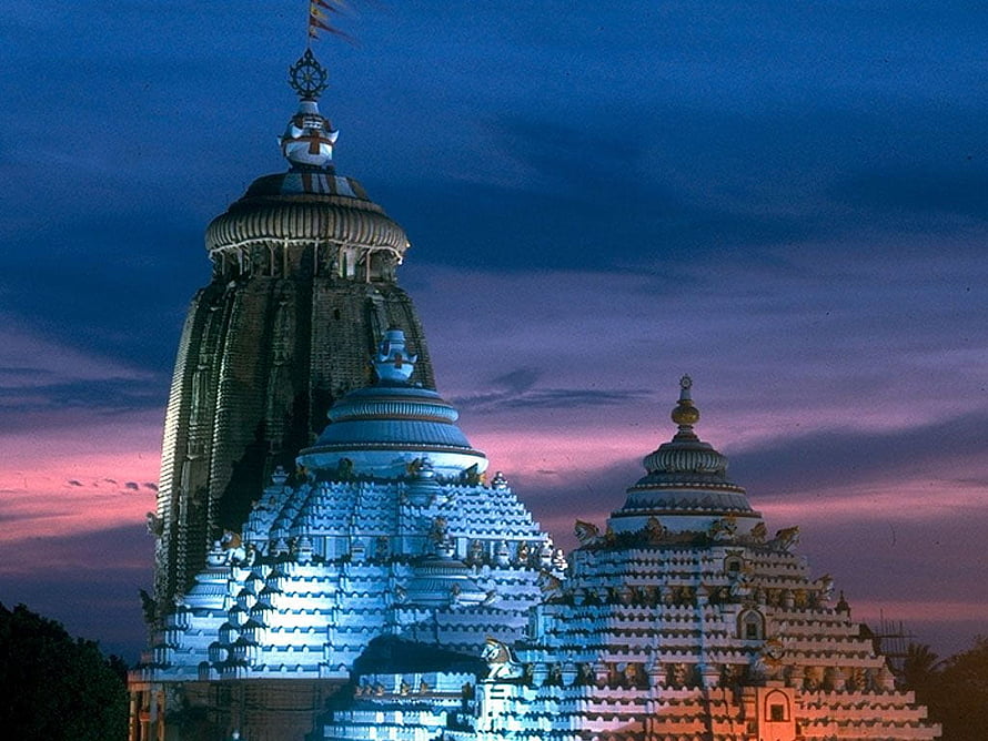 Jagannath Temple Puri at Dusk with Illuminated Shikharas and Twilight Sky HD wallpaper