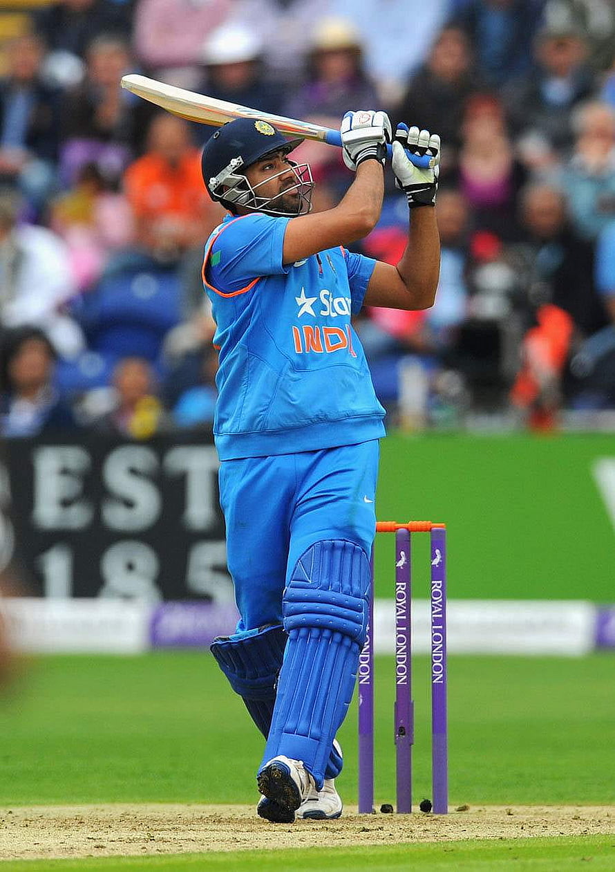 Rohit Sharma in India ODI Blue Kit Playing a Powerful Cricket Shot HD phone wallpaper