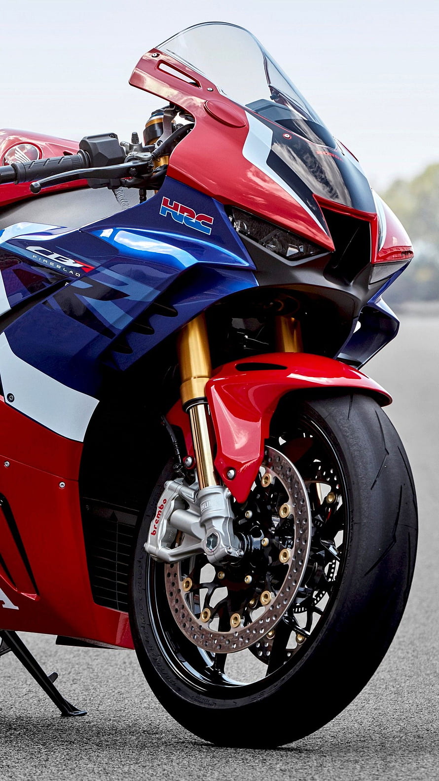 Honda CBR1000RR Fireblade HRC sportbike front end with gold forks and Brembo brakes HD phone wallpaper