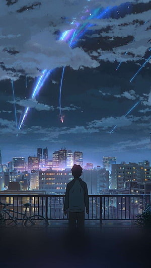 Anime Boy Watching Meteor Shower Over City Skyline at Night HD phone wallpaper