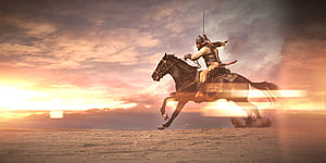 Khalid Ibn Al Walid galloping on horseback across a desert at sunset with a raised sword HD wallpaper