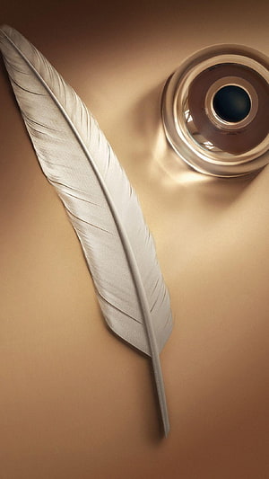Elegant White Feather and Metallic Ring on Warm Gold Background HD phone wallpaper