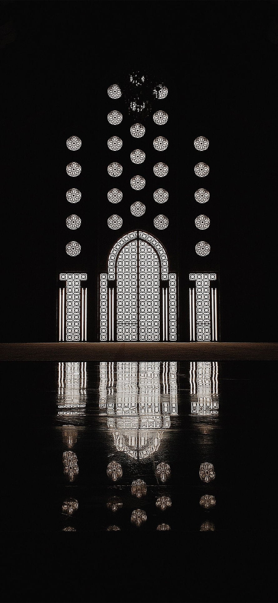 Hassan II Mosque Geometric Lattice Facade with Water Reflection at Night HD phone wallpaper
