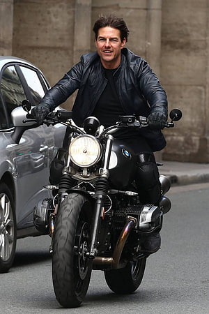 Tom Cruise Riding a Black BMW Motorcycle on a City Street in a Leather Jacket HD phone wallpaper