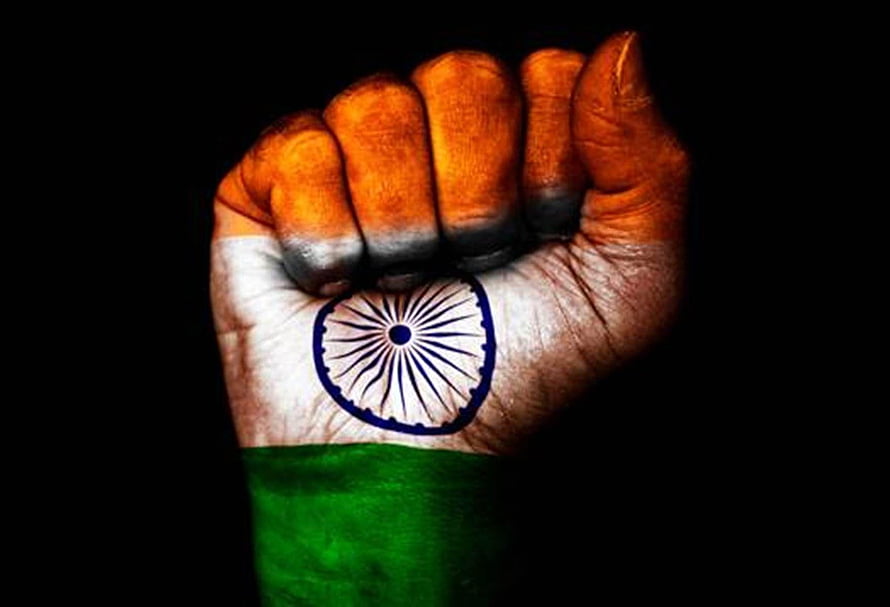 Patriotic Indian Flag Painted on Raised Fist Against Black Background HD wallpaper