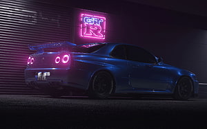 Blue Nissan Skyline GT-R R34 with Neon Sign in Dark Urban Setting HD wallpaper