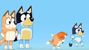 Bluey and Bingo Playing with Bandit and Chilli in a Bright Blue Sky Scene HD wallpaper