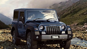 Mahindra Thar Blue SUV Off-Road Adventure in Mountain River Landscape HD wallpaper