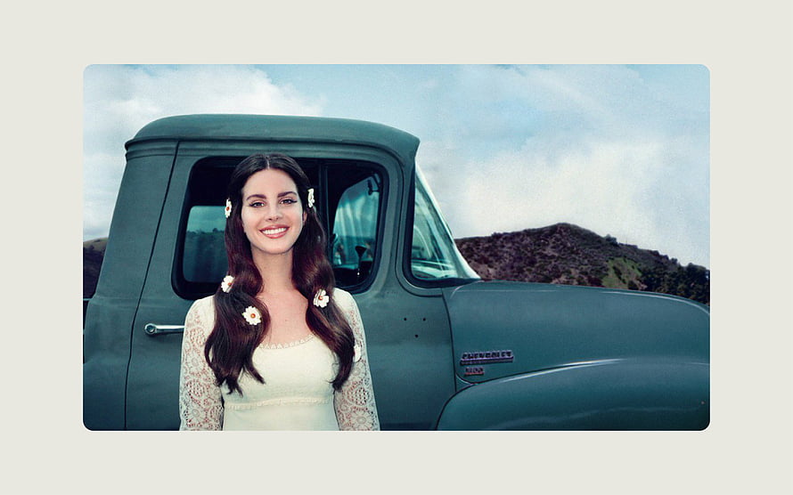 Lana Del Rey in Vintage Green Truck with Floral Hair Accessories HD wallpaper