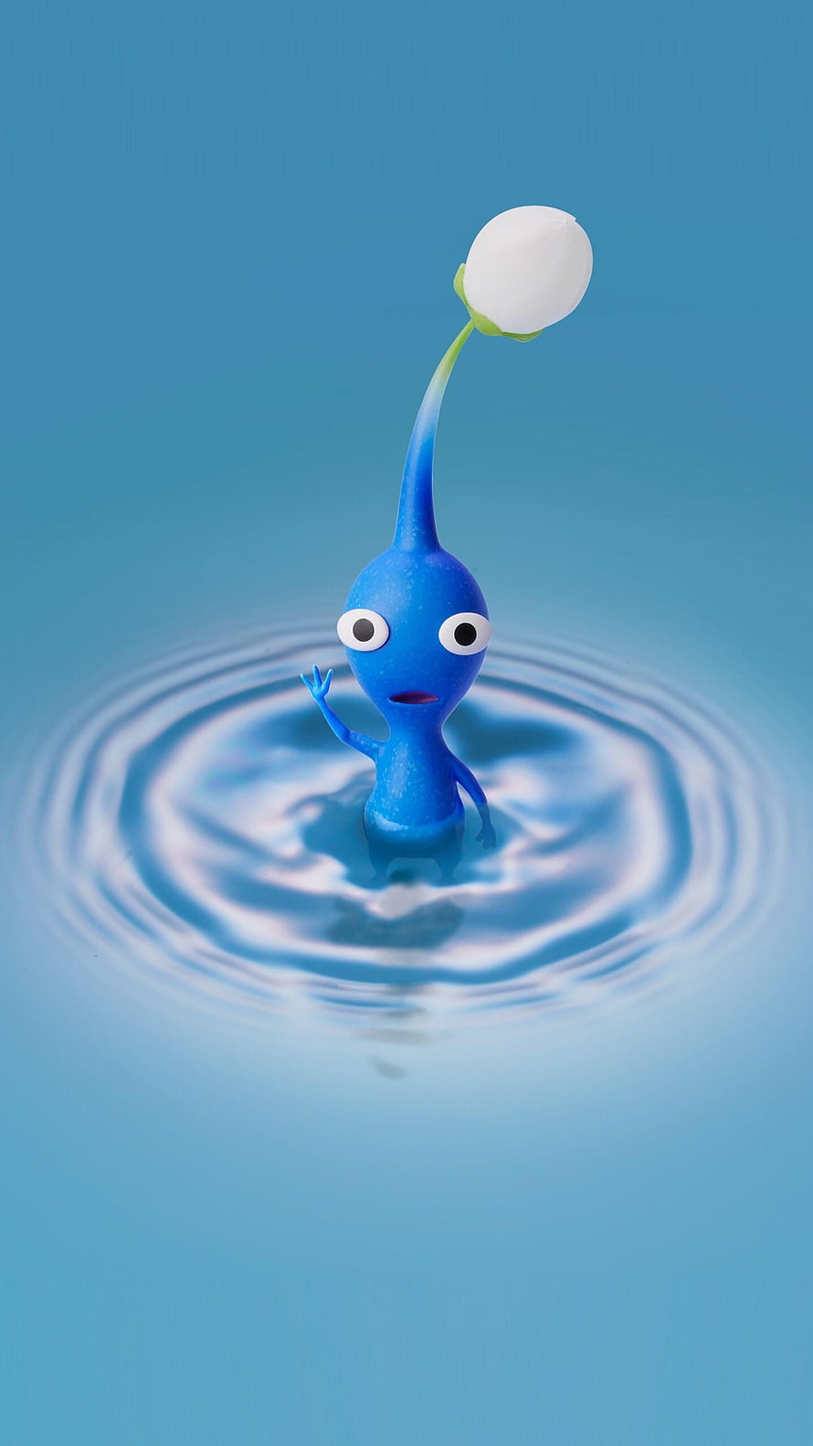 Blue Pikmin Character Standing in Water Ripples with White Flower Bud HD phone wallpaper