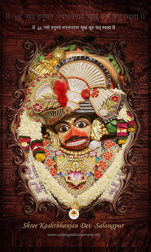 Kashtbhanjan Dev Murti at Salangpur Temple with Floral Garlands and Ornate Crown HD phone wallpaper