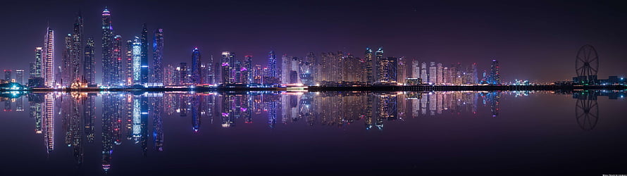 Panoramic Night View of Dubai Marina Skyline with Reflections in Water HD wallpaper