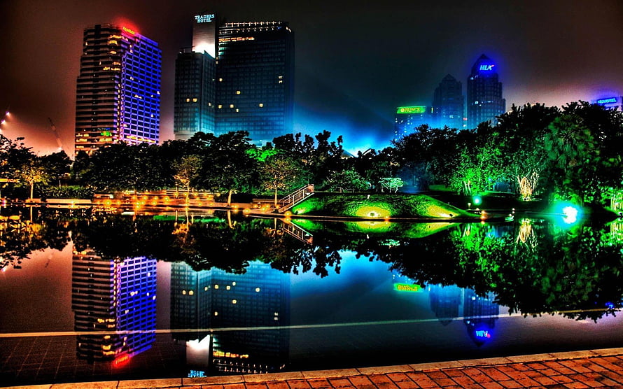 Vibrant Night Skyline of Houston Texas Reflected in Water with Colorful Skyscrapers HD wallpaper