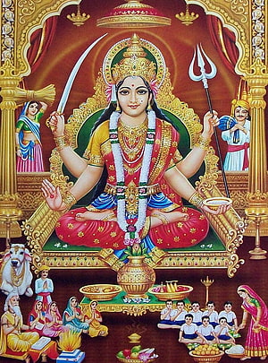 Santoshi Maa Four-Handed Deity with Sword and Trident in Ornate Temple Setting HD phone wallpaper