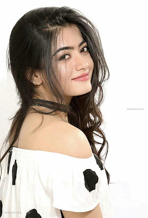Rashmika Mandanna in a White Off-Shoulder Top with Black Polka Dots HD phone wallpaper