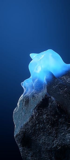 Glowing Blue Iceberg Against Deep Ocean Background HD phone wallpaper