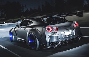 Nissan GTR R35 Liberty Walk Widebody with Blue Wheels on Night Track HD wallpaper