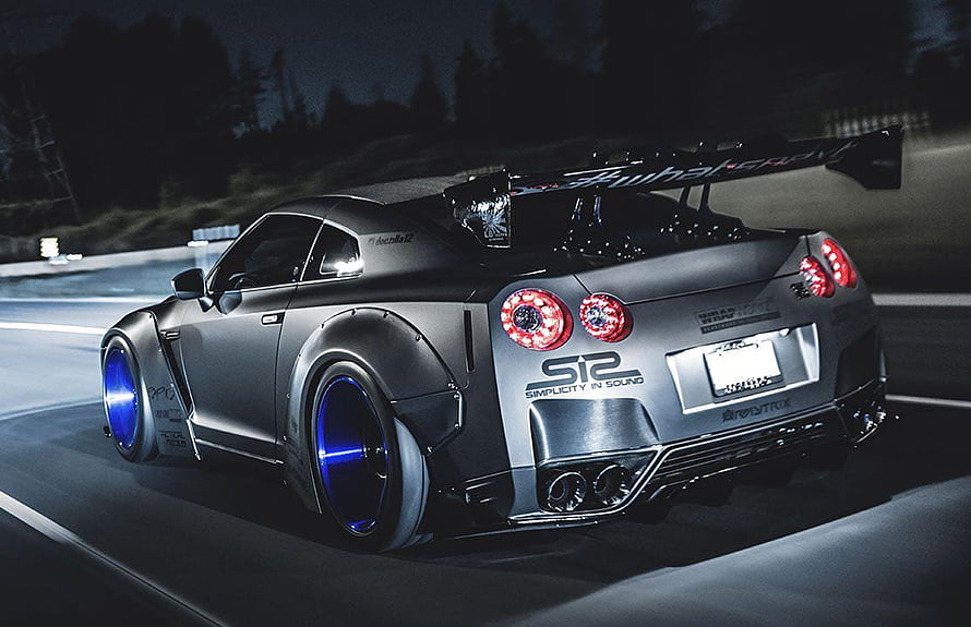 Nissan GTR R35 Liberty Walk Widebody with Blue Wheels on Night Track HD wallpaper