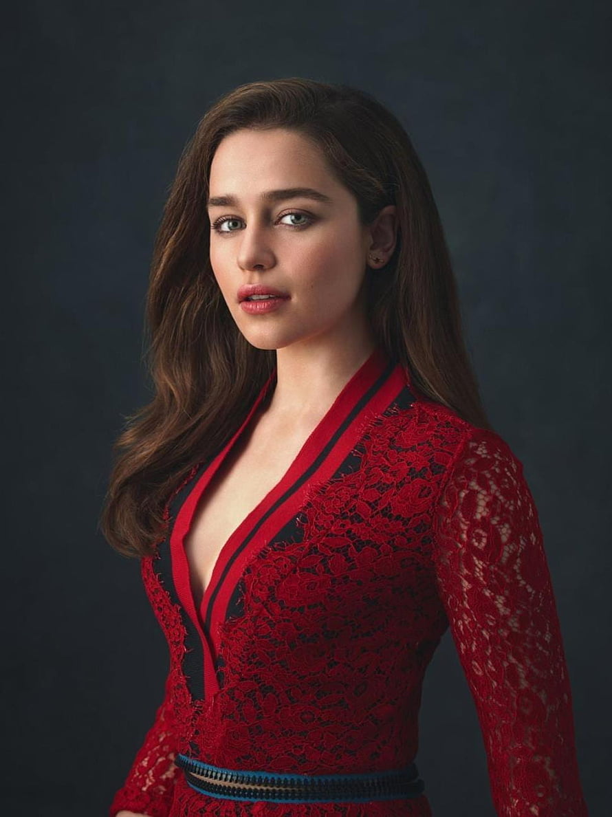Emilia Clarke in a red lace dress with dark studio backdrop HD phone wallpaper
