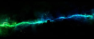 Vibrant Green and Blue Nebula Clouds Spanning a Dark Starry Sky HD wallpaper
