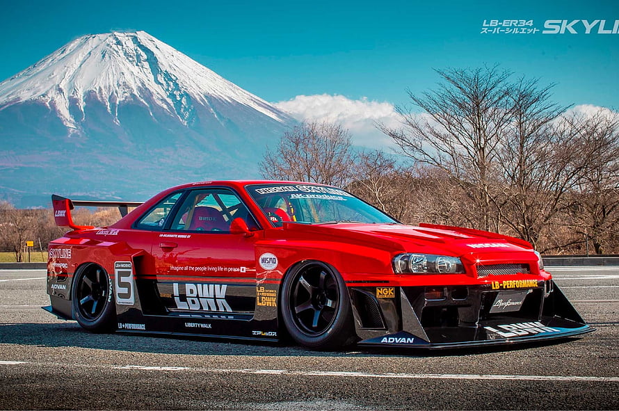 Red Nissan Skyline GT-R LB-ER34 Widebody with Mount Fuji Background HD wallpaper