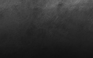Dark Gray Concrete Texture Background with Subtle Surface Grain and Muted Tonal Depth HD wallpaper