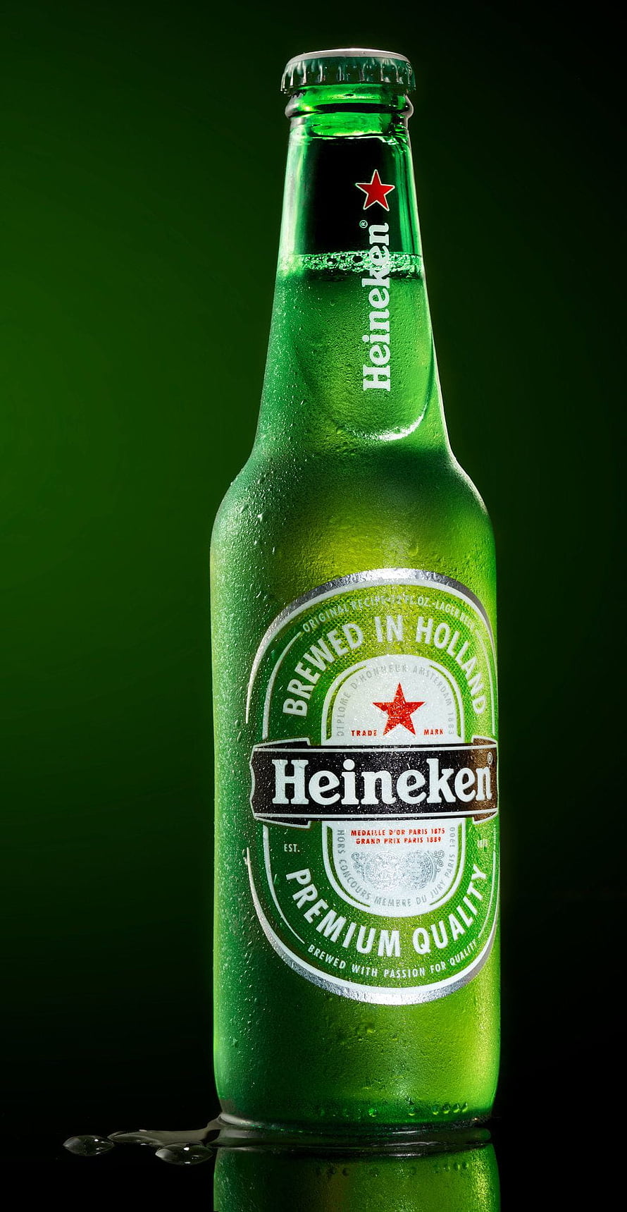 Chilled Heineken Beer Bottle with Condensation on Dark Green Background HD phone wallpaper
