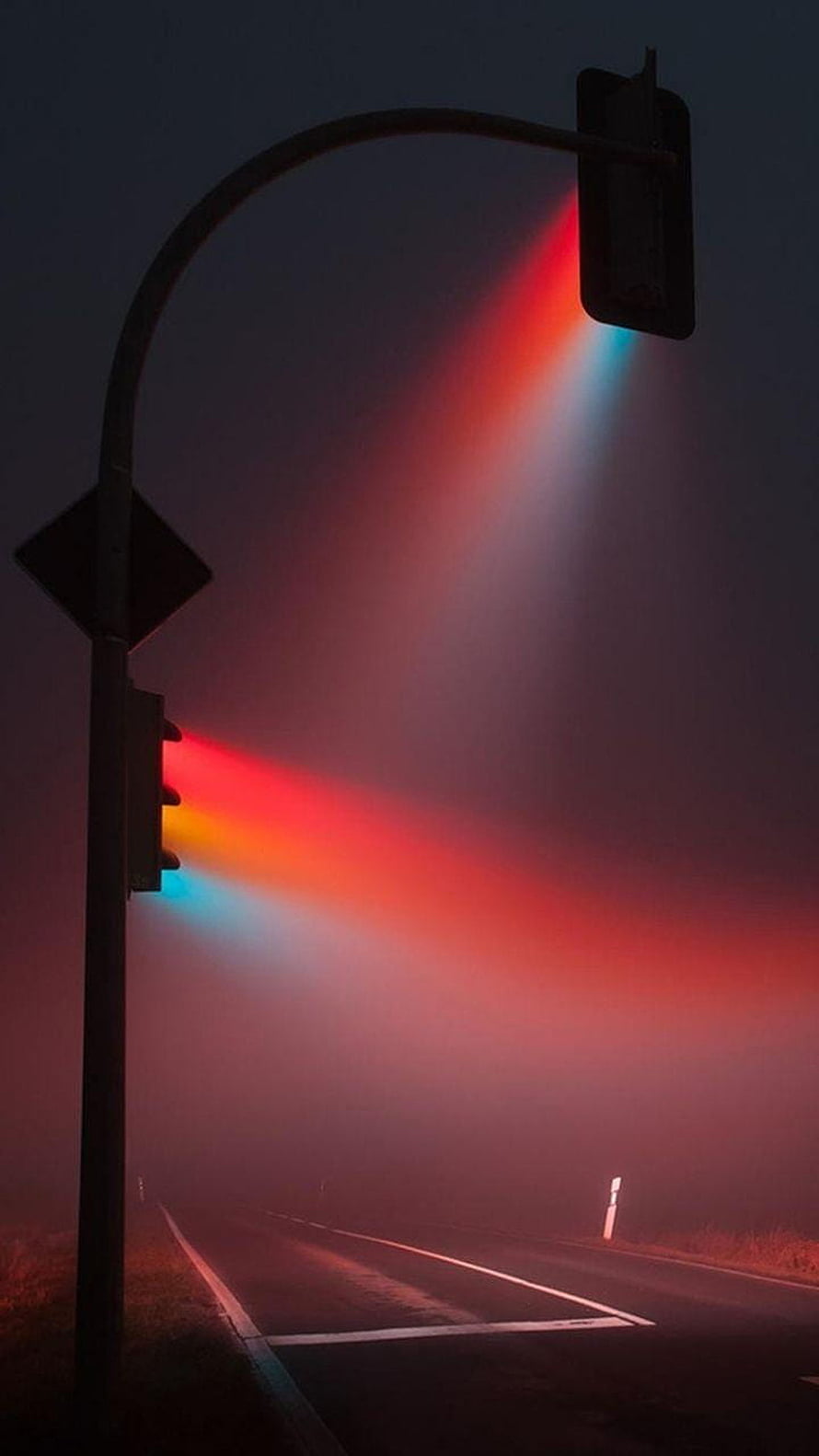 Misty Road with Glowing Traffic Lights in Fog HD phone wallpaper