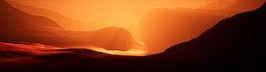 Vast Orange Desert Planet Landscape with Distant Mountains and Hazy Horizon HD wallpaper