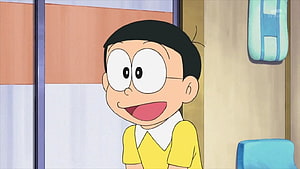 Nobita Nobi from Doraemon smiling in a yellow shirt anime wallpaper HD wallpaper
