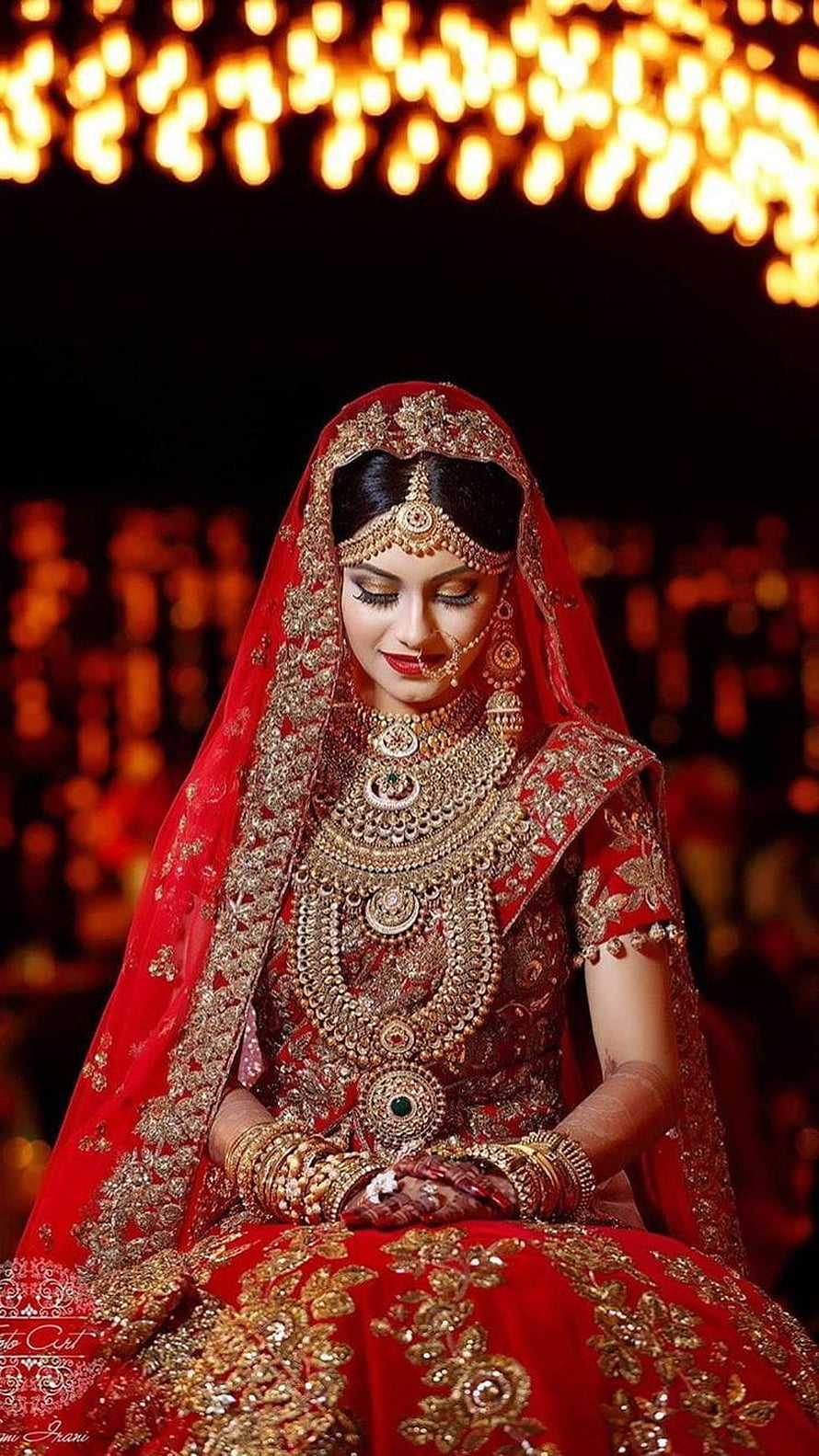 Elegant Indian Bride in Red Lehenga with Heavy Gold Jewelry and Henna HD phone wallpaper