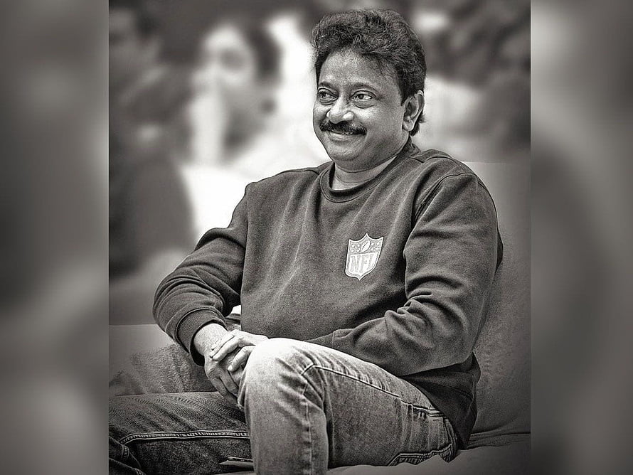 Ram Gopal Varma in a relaxed black and white portrait wearing an NFL sweatshirt HD wallpaper