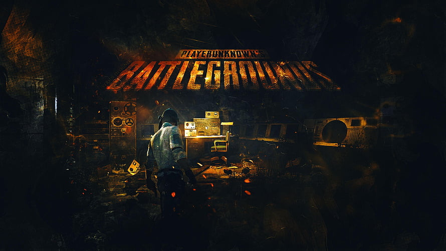 PlayerUnknown's Battlegrounds Dark Industrial Interior with Glowing Logo and Lone Soldier HD wallpaper
