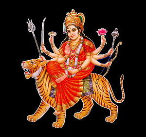 Goddess Durga Riding a Tiger with Weapons and Lotus in Traditional Indian Art HD wallpaper