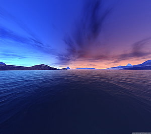 Serene Ocean Horizon at Dusk with Distant Mountain Peaks and Dramatic Clouds HD wallpaper