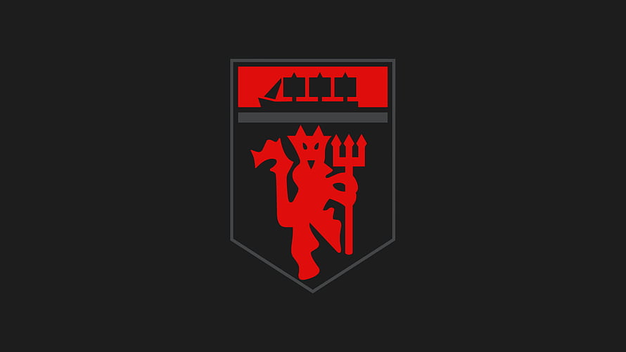 Manchester United Red Devil Crest Emblem on Dark Background HD wallpaper