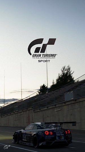 Gran Turismo Sport Nissan GT-R Nismo GT3 race car on track at dusk HD phone wallpaper