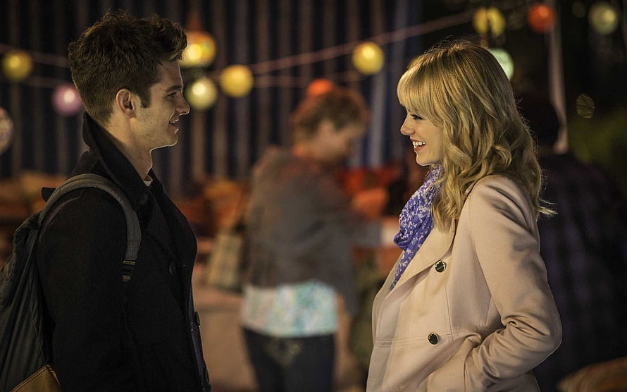 Peter Parker and Gwen Stacy sharing a warm moment at a festive night market HD wallpaper