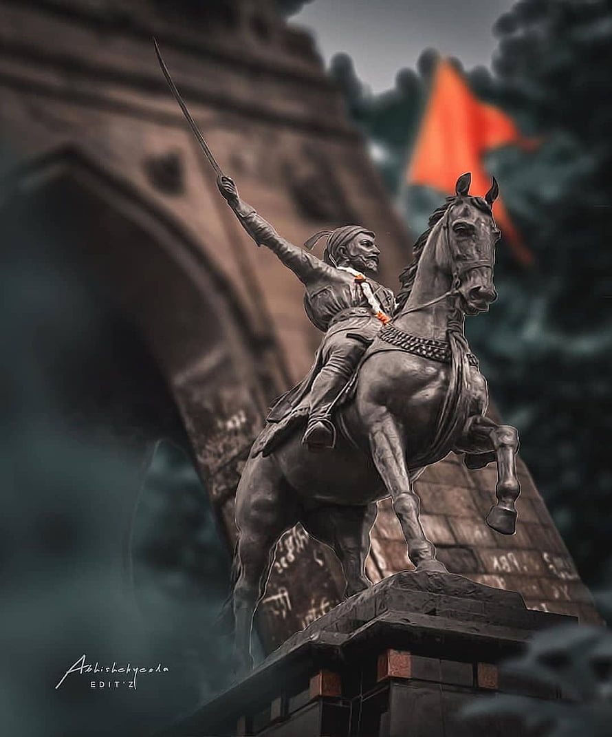 Shivaji Maharaj Equestrian Statue with Raised Sword and Orange Flag HD phone wallpaper