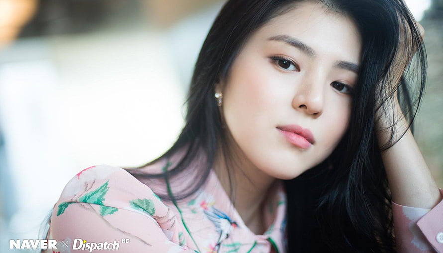 Han So Hee in a Soft Pink Floral Blouse with Natural Makeup and Long Dark Hair HD wallpaper
