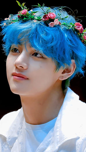 V from BTS with Blue Hair and Flower Crown Portrait HD phone wallpaper