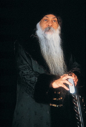 Osho Portrait in Dark Robes with Long White Beard and Ornate Cane HD phone wallpaper