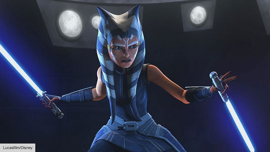 Ahsoka Tano wielding dual blue lightsabers in a dark sci-fi interior HD wallpaper