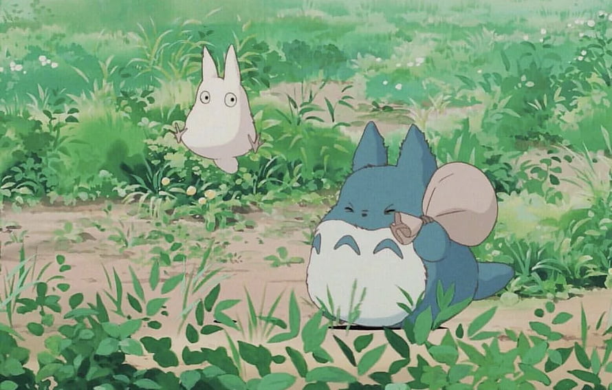 Totoro and Chibi Totoro in a Lush Green Meadow from Studio Ghibli HD wallpaper