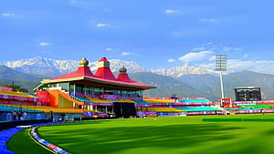 Himachal Pradesh Cricket Association Stadium in Dharamshala with Snow-Capped Mountains HD wallpaper