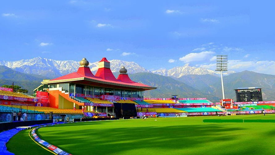 Himachal Pradesh Cricket Association Stadium in Dharamshala with Snow-Capped Mountains HD wallpaper