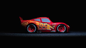 Lightning McQueen 95 Racing Car Model with Rust-eze Sponsorship on Black Background HD wallpaper