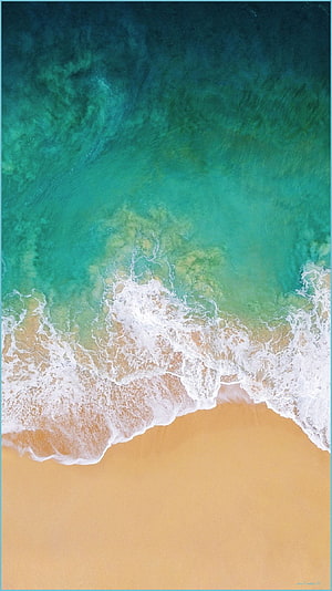 Aerial View of Turquoise Ocean Waves Crashing on Golden Sand Beach HD phone wallpaper
